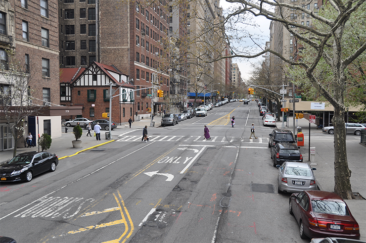 Before conditions: Pedestrians cross West End Avenue at W 95th Street.