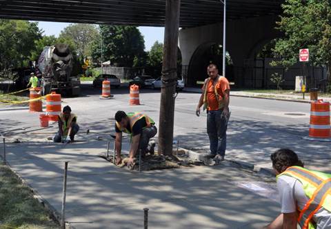 DOT crews working on pedestrian safety measures.