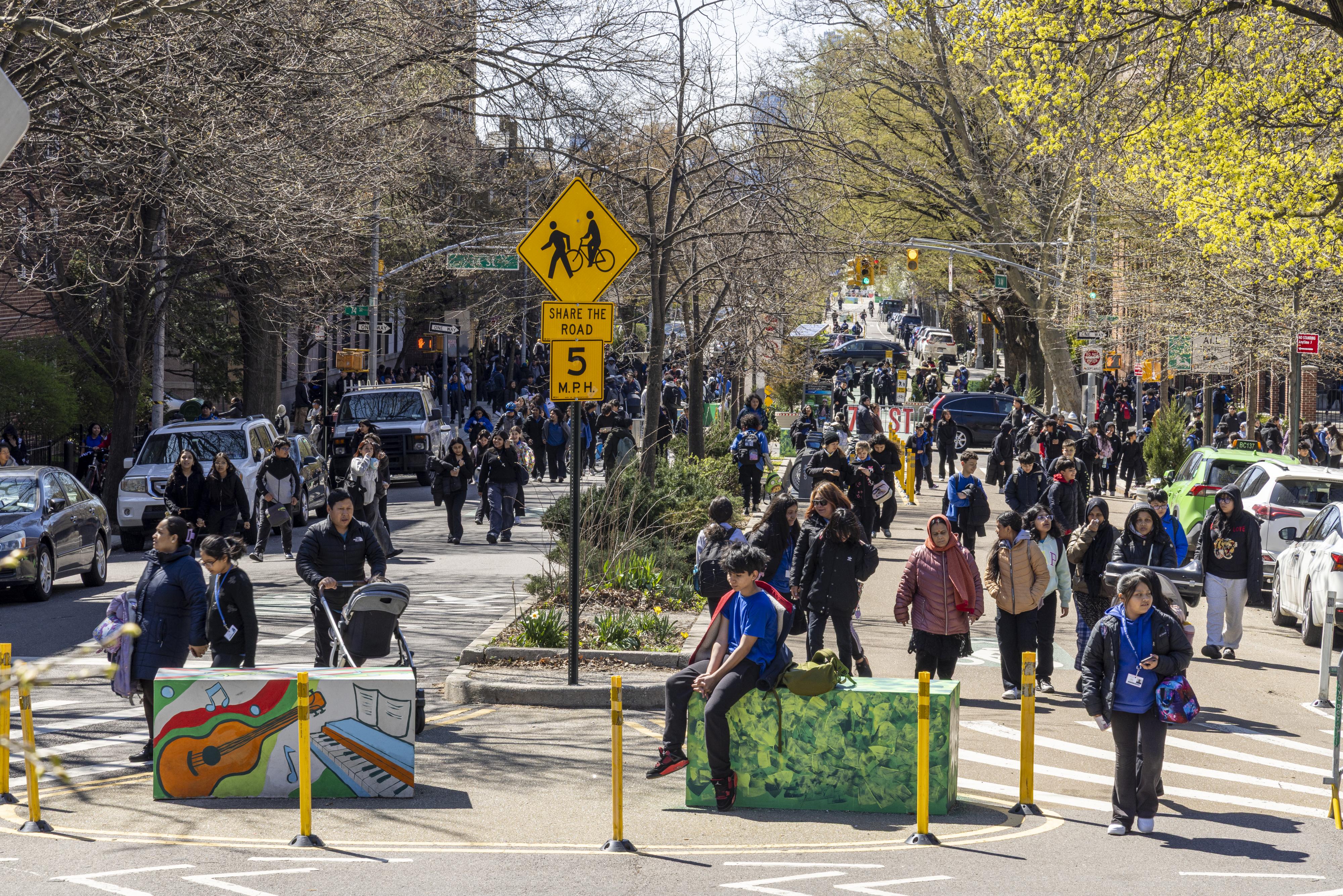 Students walk along the 34th Avenue Open Street in Jackson Heights, Queens when the roadway was closed to vehicles.