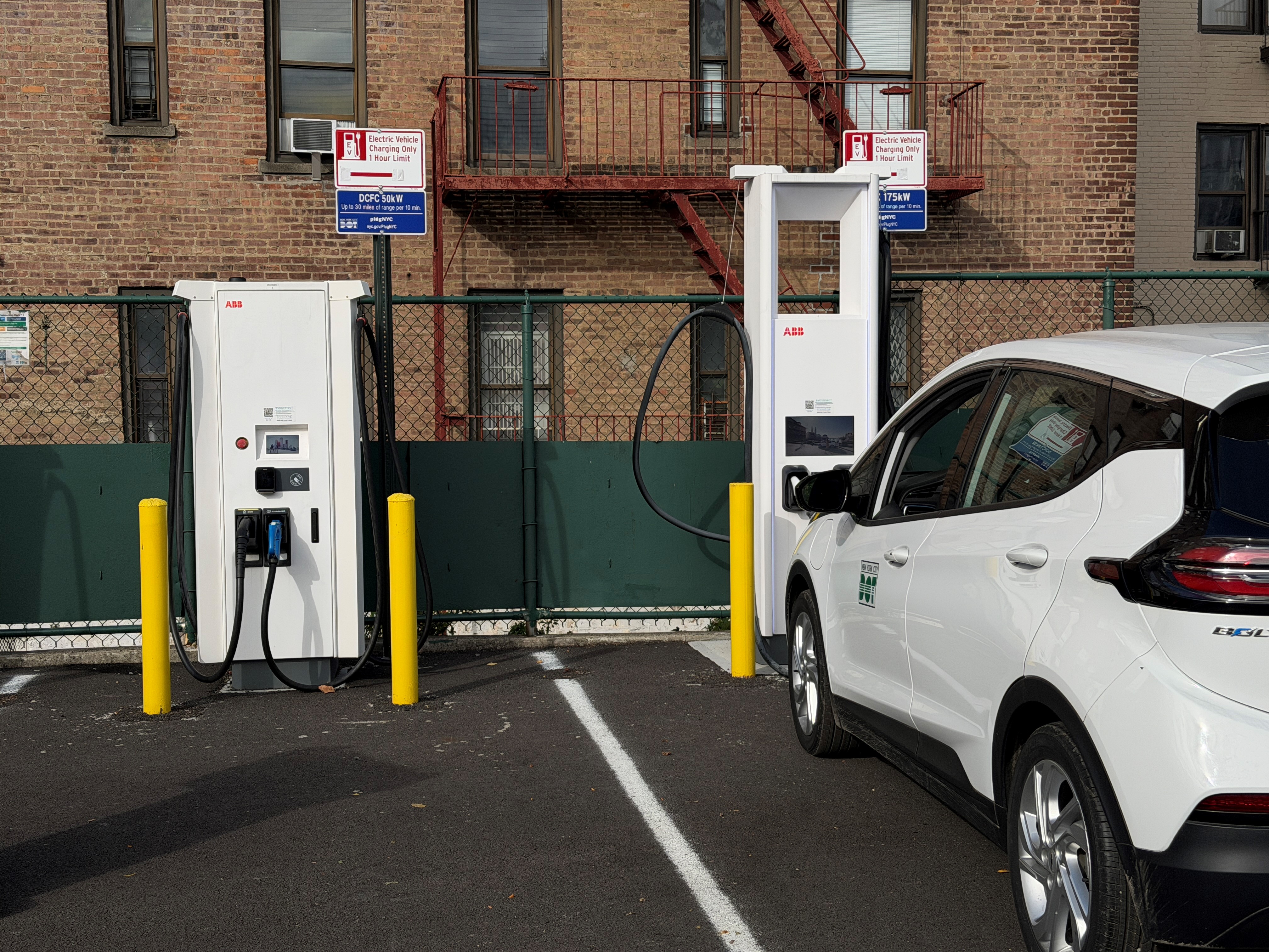 A photo of the public fast-charging stations in the NYC DOT municipal lot at 2071 White Plains Road in the Bronx