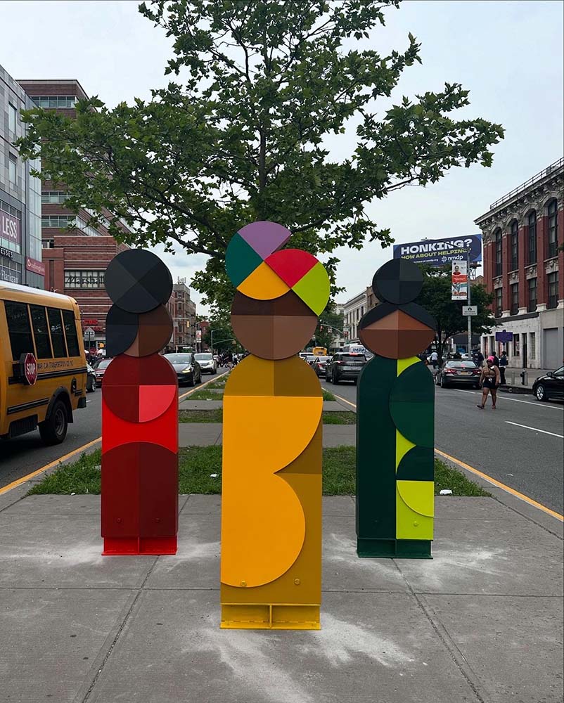 Aunties by Fitgi Saint-Louis, sculpture is on display on 124th Street and Lenox Avenue in Manhattan