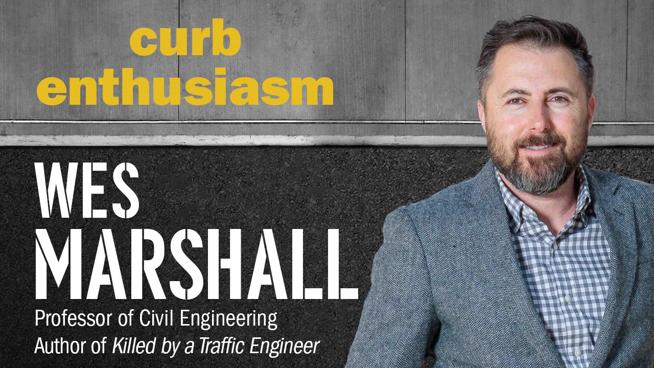 Image of Professor Wes Marshall, smiling with text 'Curb Enthusiasm' above.