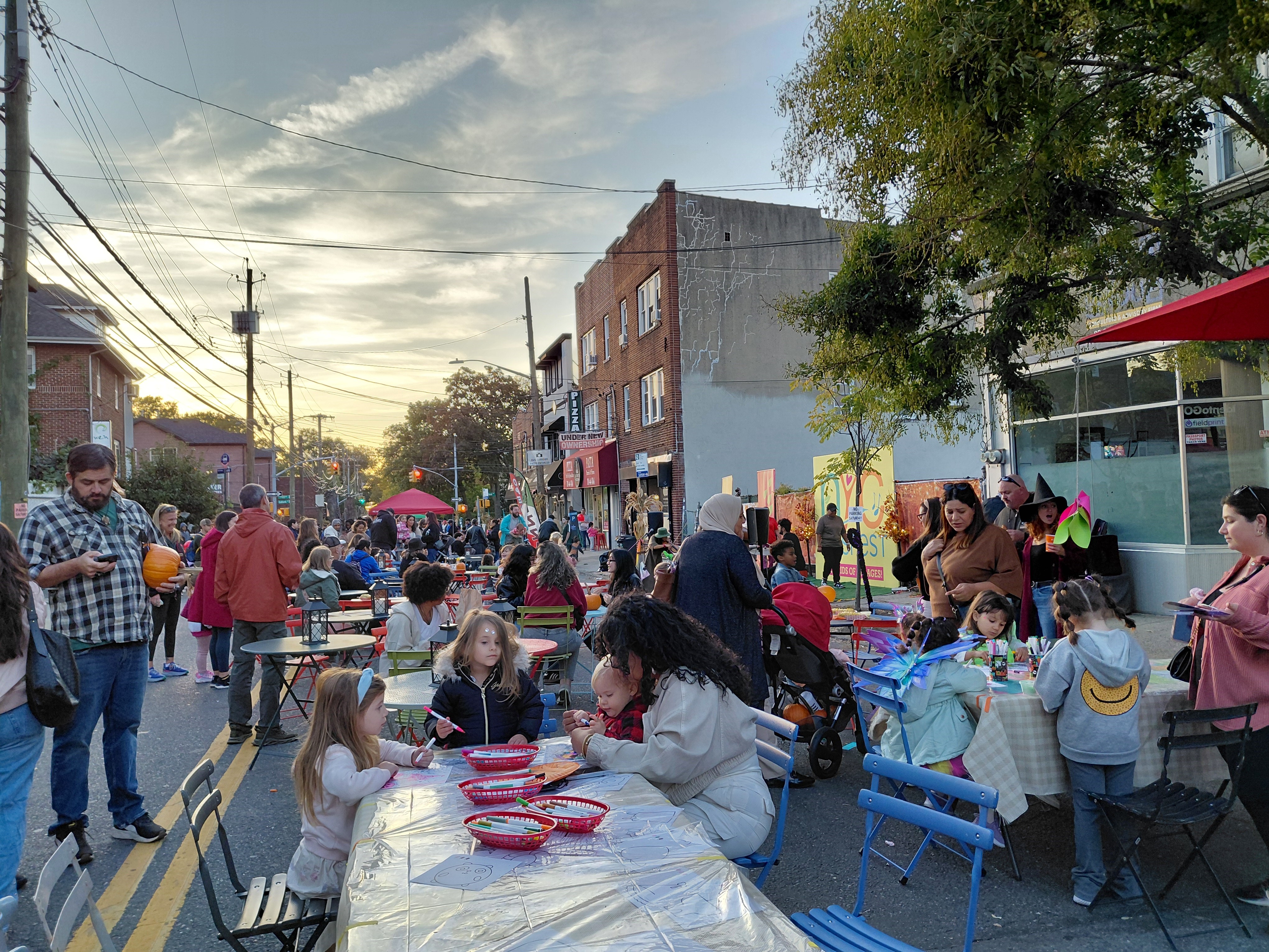 Trick-or-Streets attendees enjoy kid's activities on Castleton Avenue on Staten Island.