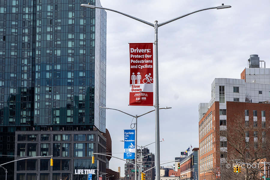 Vision Zero Banner Installation on Atlantic Avenue in Brooklyn. Credit: NYC DOT.