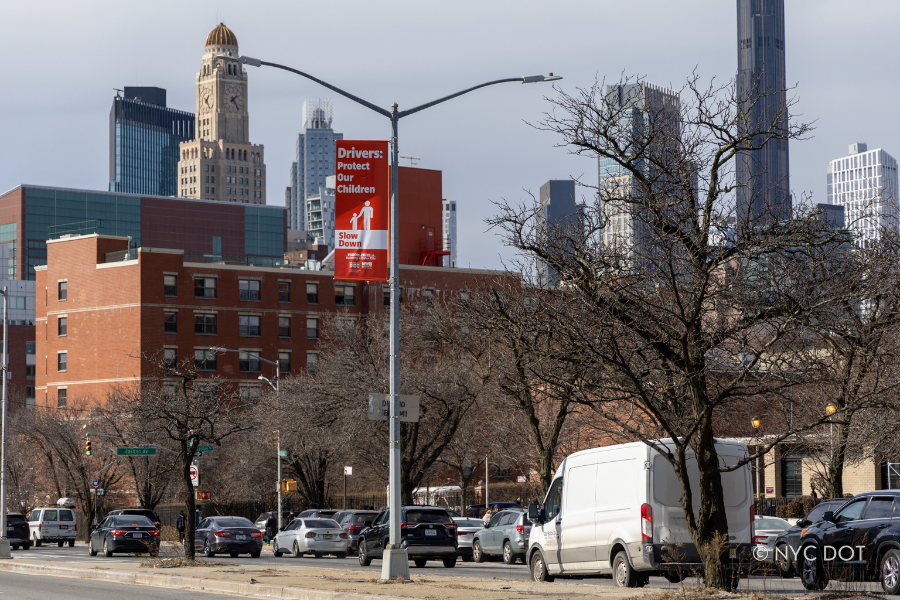 Vision Zero Banner Installation on Atlantic Avenue in Brooklyn. Credit: NYC DOT