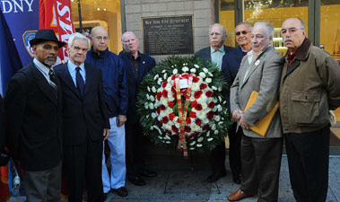 Chief of Department Salvatore Cassano, First Deputy Fire Commissioner Frank Cruthers and *********** laid a wreath to commemorate the 42nd Anniversary of the 23rd Street fire. Numerous active and retired members took part in the ceremony, including FF Brian Finley (far left) and retired Capt. Manny Fernandez (fourth from the right).