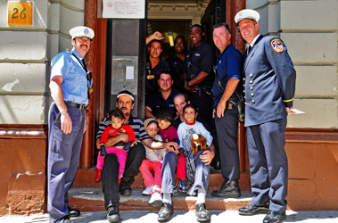 Members of Ladder 14 are reunited with Rassas Al Ghaithi and his four daughters in Harlem. 