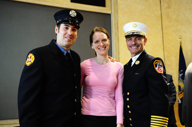 Lt. Robert Dereskewicz at promotions with his wife and Chief of Department Salvatore Cassano.