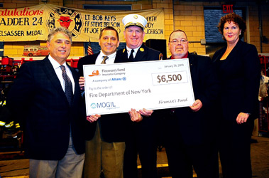 A check for $6,500 is presented to the FDNY for the forcible entry simulator on behalf of the Mogil Orgaization and Fireman&rsquo;s Fund Insurance Company. (L to R) Jeff Mogil, CEO of the Mogil Organization; Bob Mogil, President of the Mogil Organization; Thomas Galvin, FDNY's Chief of Training; Terry McCormick, Relationship Manager at Fireman&rsquo;s Fund; and Jean O'Shea, Executive Director of the FDNY Foundation.