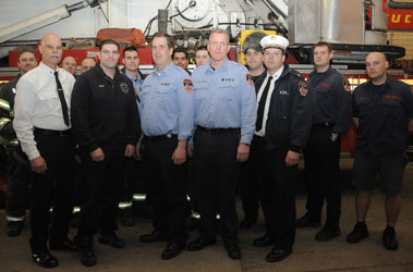 Members who helped rescue victims of two fires in Manhattan. (Front row, L to R) BC Gerald Koziak, FF Joseph Barone, Capt. Kevin Harrison, Capt. Paul Lawlor (L-21), BC Jack Joyce. (Second row, L to R) FF John Tota (L-2), FF Andy Owens (L-2), FF John Phillips (L-2), Lt. Tony Pasquin (L-2), FF Steve Koch (L-2), FF Adam Torres (L-21), FF Michael O'Connell (L-21) and FF Paul Bonacci (L-21).