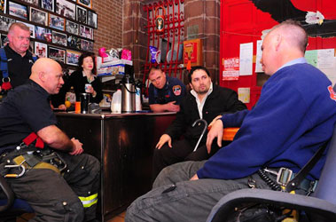 Lt. Tom Donnelly (far right) and Firefighter Sean Cummins (seated on left) from Rescue 1, as well as Rescue Paramedic Juan Henriquez (not pictured) were reunited with Jhon Gallego, who they helped pull from the wreckage of the crane collapse in March 2008.