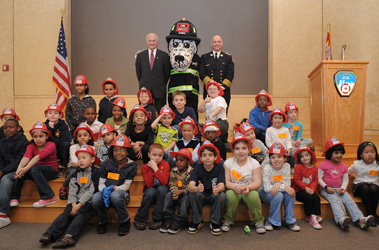 Fire Commissioner Nicholas Scoppetta, Chief of Department Salvatore Cassano and the FDNY fire safety mascot, HotDog, joined the children of many FDNY members for the 8th Annual Take Our Children to Work Day at FDNY Headquarters.