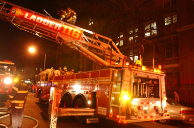 Members of Ladder 116 operating at a fire in 2004.