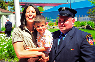 Nicholas Grande and his mom, Samantha Grande, thank EMT David Goodman, who helped save his life in 2007.