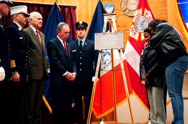 Mayor Michael Bloomberg, Fire Commissioner Nicholas Scoppetta, Chief of Department Salvatore Cassano,  FDNY Chaplain Rev. Stephen Harding and a ceremonial officer stand with Probationary Firefighter Jamel M. Sears' mother, Jonnie, and sister, Charmaine, as a memorial plaque is dedicated in the firefighter's honor.