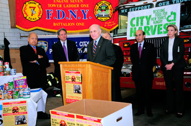Fire Commissioner Nicholas Scoppetta and Chief of Department Salvatore Cassano join members of City Harvest, the New York Daily News, children from I.S. 141 and many others at the kick off for the "Daily News Readers Care to Feed the Hungry" food drive.
