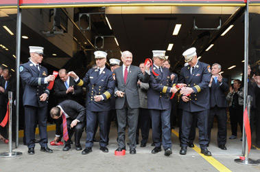The ribbon is cut, officially opening the new quarters of Rescue 3. (L to R) Rescue 3 Capt. James Ellson, Deputy Commissioner of the DDC David Resnik, Chief of Department Salvatore Cassano, Fire Commissioner Nicholas Scoppetta, Chief of Operations Robert Sweeney and Chief of the Special Operations Command William Seelig.