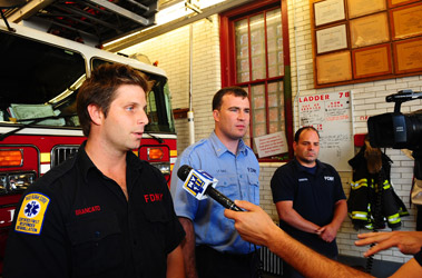 The members talk to the media about their rescue