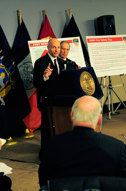 Fire Commissioner Salvatore Cassano speaks to the media in the FDNY's Operations Center