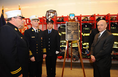 A plaque honoring the company's 100 years was unveiled during the ceremony. FDNY Chaplain Msgr. John Delendick blessed the plaque as Commissioner Salvatore Cassano, Chief Edward Kilduff and the honor guard stood by.