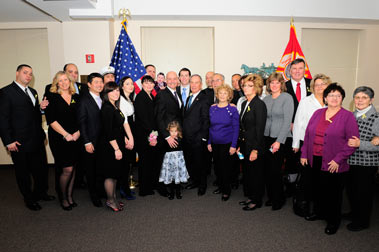 The Cassano family (including the new Fire Commissioner Salvatore Cassano) with Mayor Michael Bloomberg.