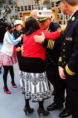 Survivor Kim Williams and her daughter thank FDNY officers and the members who helped save her life.