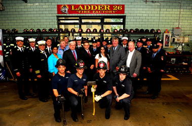 Representatives from Fireman's Fund Insurance and CMJ Underwriters join FDNY chiefs and firefighters at the quarters of Engine 58/Ladder 26 in Manhattan for the grant check presentation.