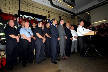 Mayor Michael Bloomberg addresses the media, along with Fire Commissioner Salvatore Cassano, Chief of Department Edward Kilduff, members of area fire companies who performed the rescues and local politicians.