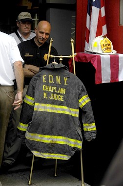 Father Mychal Judge's bunker coat and helmet, which was recovered in the rubble of the World Trade Center, was dedicated during the walk. The gear will now be part of a permanent exhibit at the New York City Fire Museum.