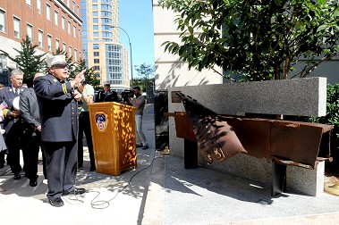 FDNY Chaplain Monsignor John Delendick blesses the new memorial at FDNY Headquarters dedicated to the 343 FDNY members who lost their lives on 9/11.