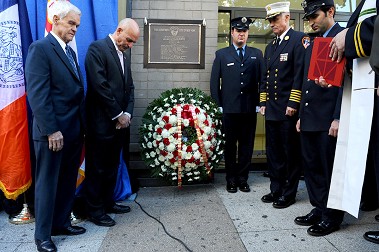 A new plaque is dedicated at the site of the 23rd Street fire, where 12 FDNY firefighters were killed on Oct. 17, 1966.