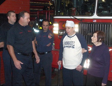 FF Chris Magas, FF Ed Rissland, FF Daniel Gunning, John Russo and Florence Russo.
