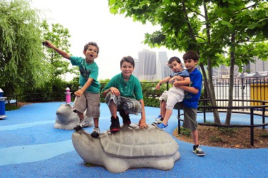 The boys playing in Brooklyn Bridge Park.