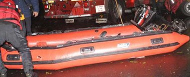 Firefighters using a Swift Water boat the night Sandy hit New York City.