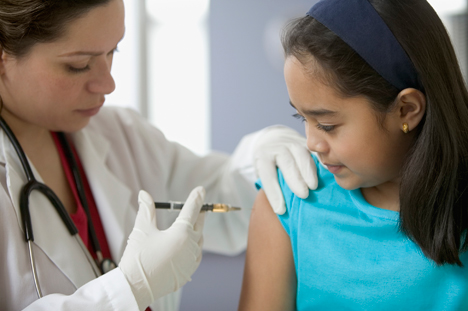 Adolescent child getting HPV vaccine