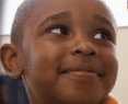 Photo of young boy getting health services
