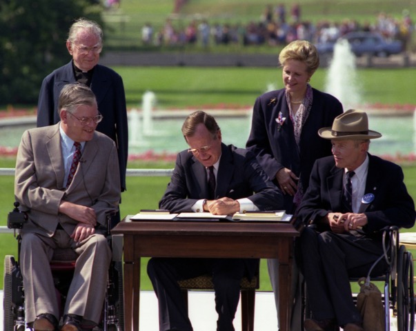 Photo of the signing of the Americans with Disabilities Act Photo of the signing of the Americans with Disabilities Act