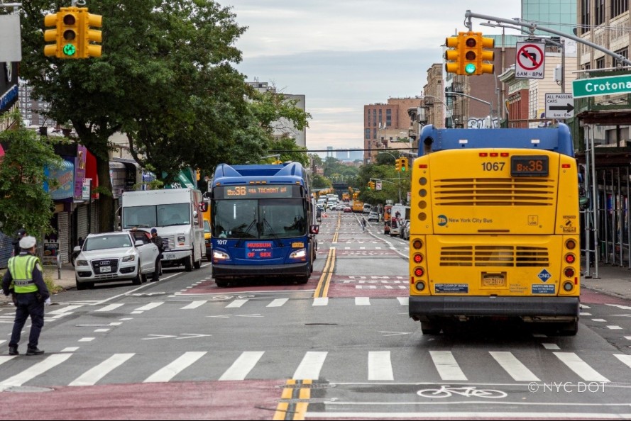 Bx36 buses travel in the recently activated busway on Tremont Avenue in the Bronx.