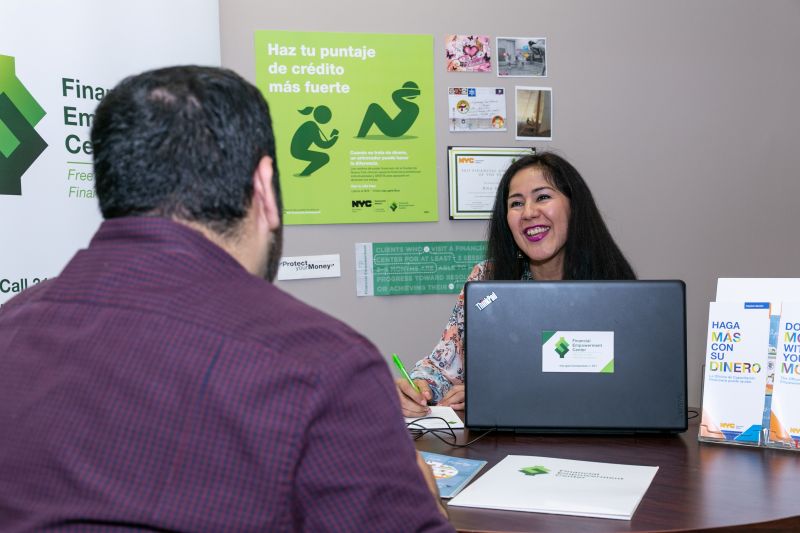 female financial counselor advising a man