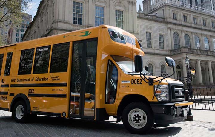 NYC Department of Education school bus parked at City Hall.
                                           
