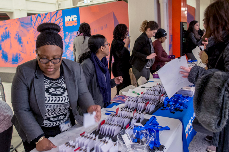 DDC staff welcome people to the Contractors Open House.