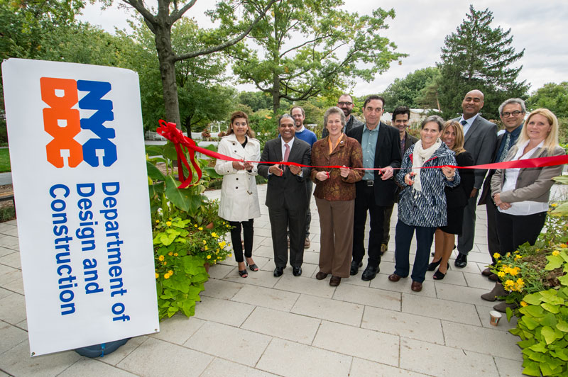 Picture of officials cutting the ribbon on the new pathways