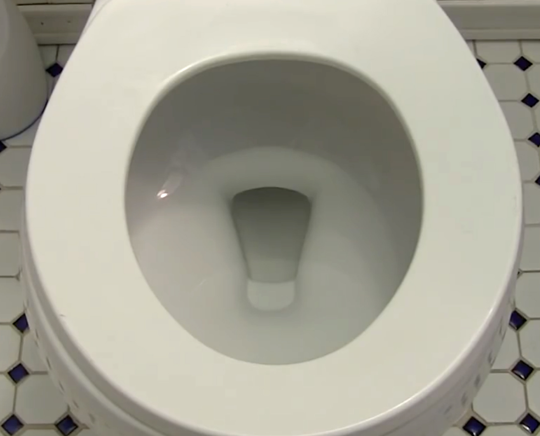 Toilet with no blue dye in the bowl