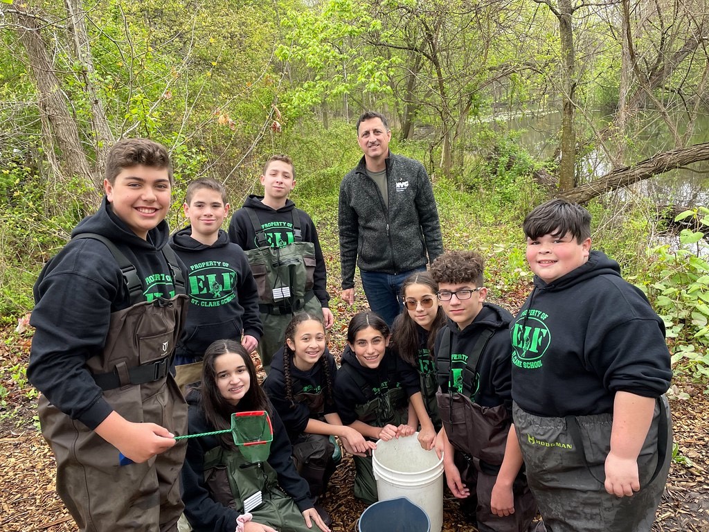 Participating students pose at Richmond Creek Bluebelt for the annual eel count