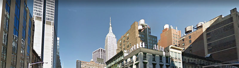 Tops of buildings with the Empire State Building in the background
