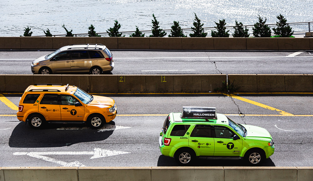 Image of yellow and green taxis