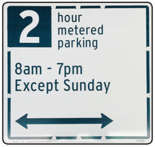 A white sign with a large blue 2. Text reads: 2 hour metered parking 8am-7pm except Sunday. A blue arrow points in both directions
