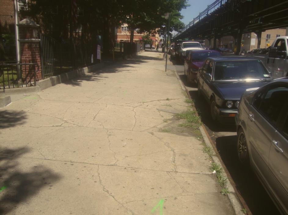 Before photo of sidewalk repair at Parkside Houses in The Bronx